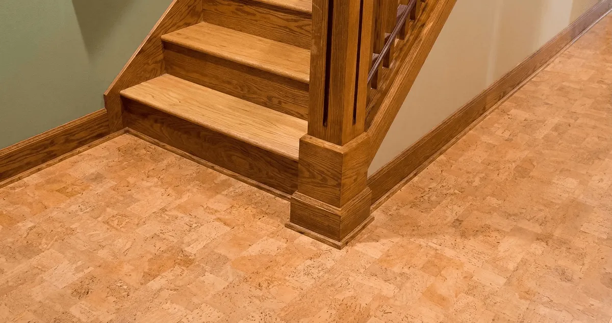 End of a staircase with cork flooring in Providence, RI